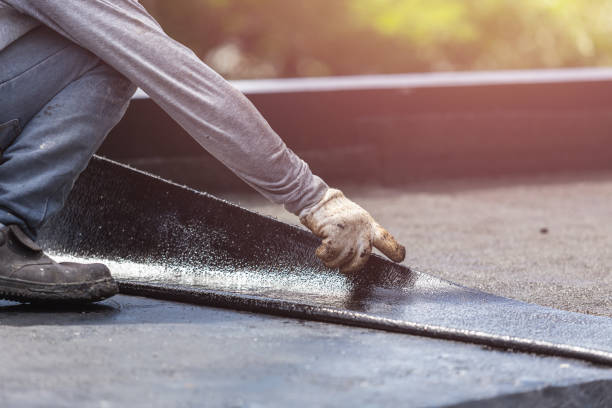 Professional Emergency Waterproofing technician working in Maryville, IL